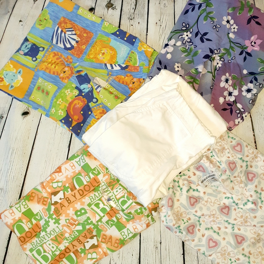 Lot Of 5 piece previously loved  scrubs